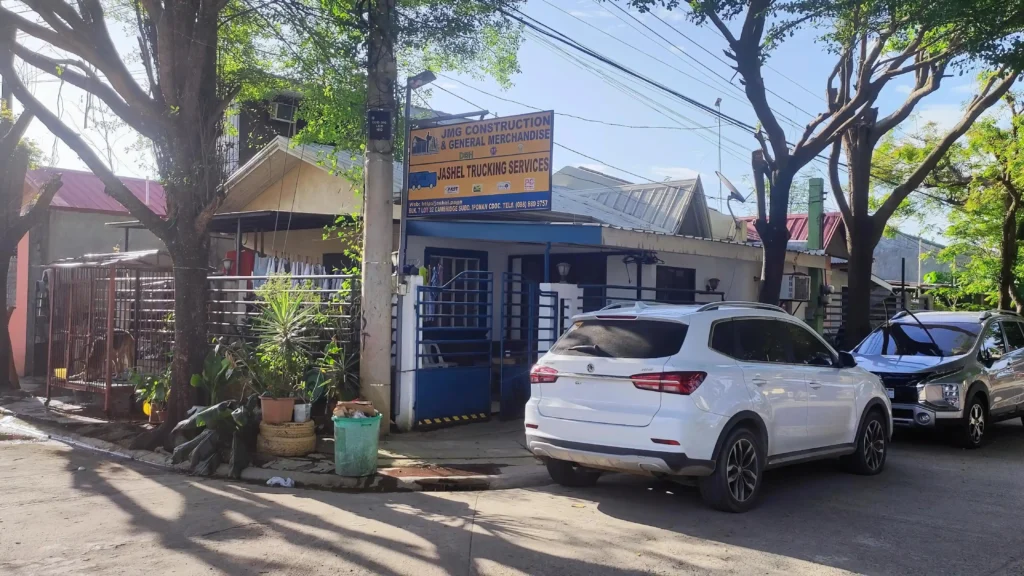 Exterior view of JMG Construction & General Merchandise office in Cagayan de Oro, showcasing their local presence and services.